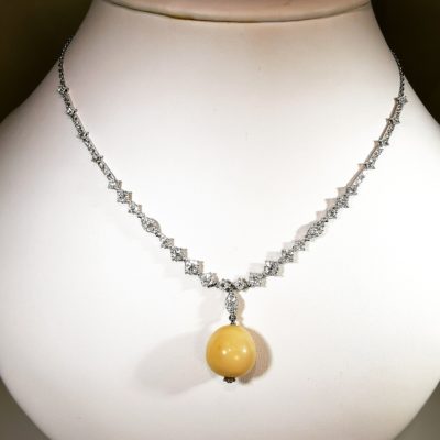 Cassis perle fine collier OG18K diamants