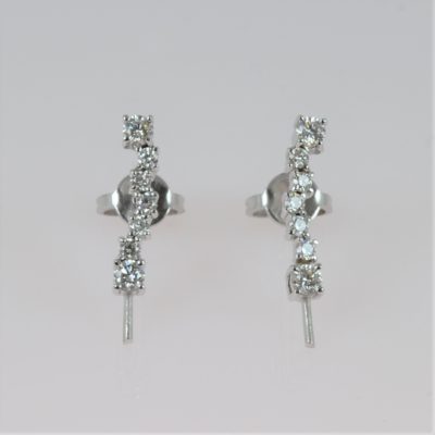 Boucles oreilles syst. OG18K diamants