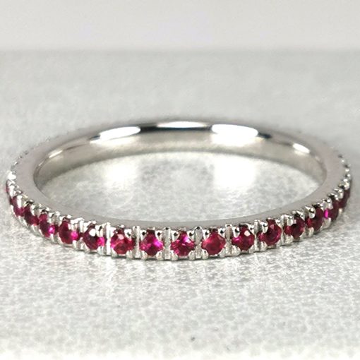 Eternity wedding rings in 18K gold with precious stones