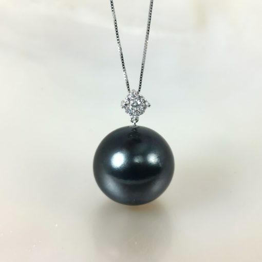 Rare et énorme perle naturelle ronde de Tahiti 16 mm diamants