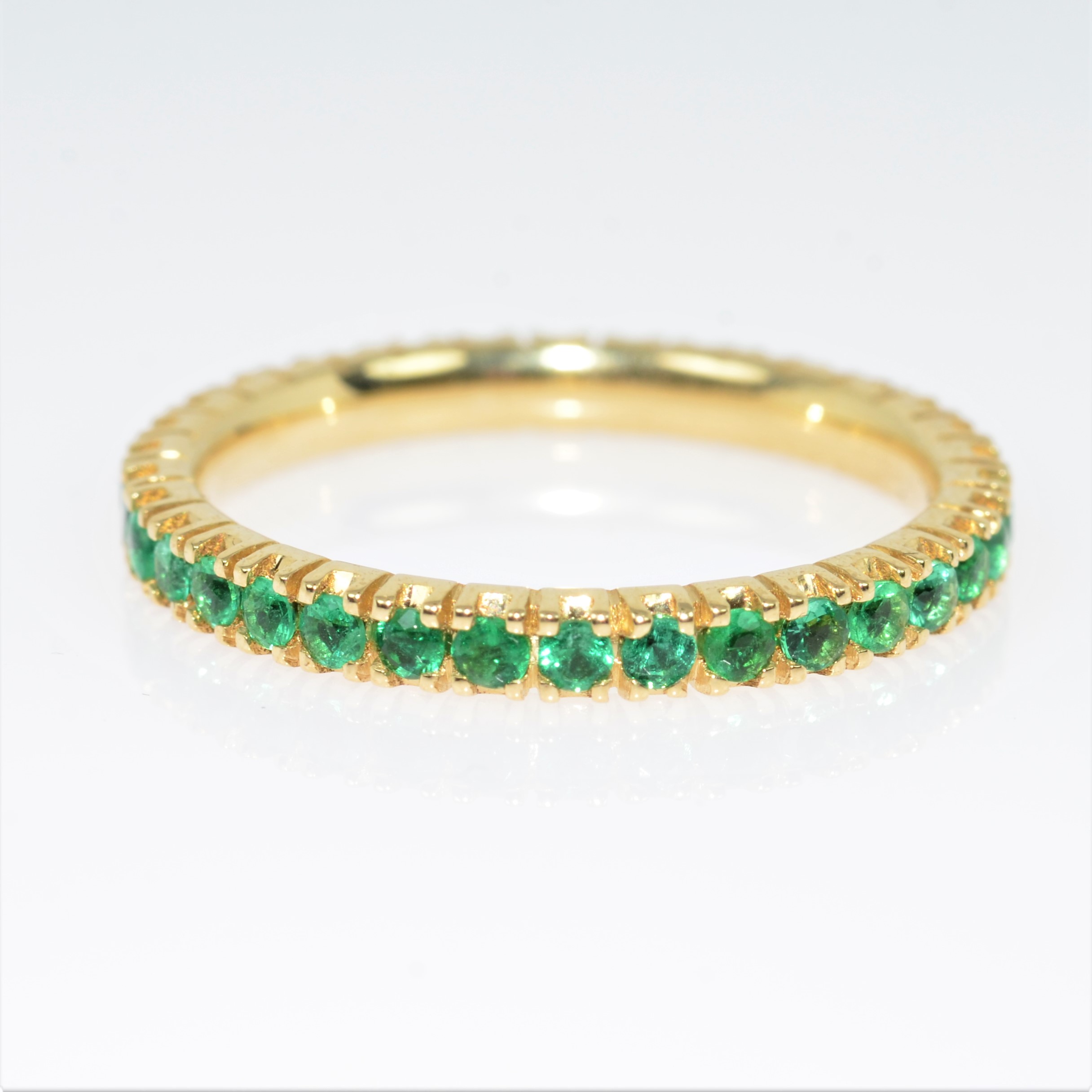 Eternity ring emeralds
